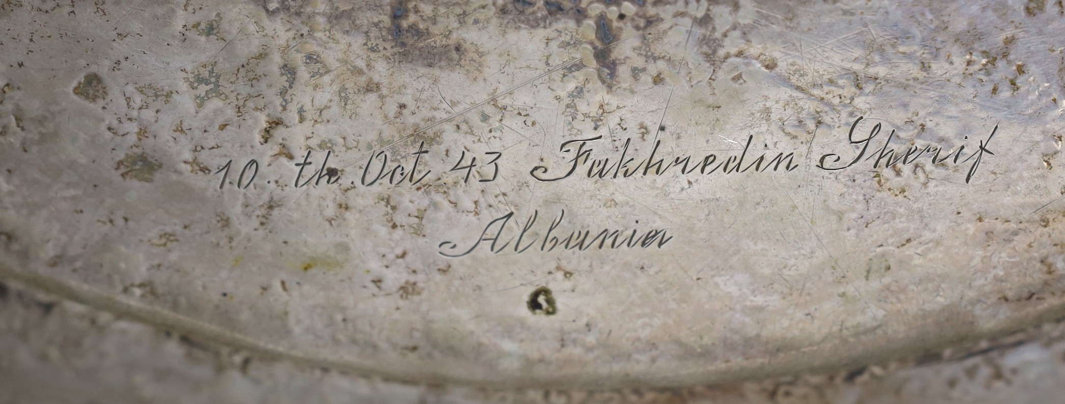 A Persian engraved white metal tray, 43.7cm, 49oz.